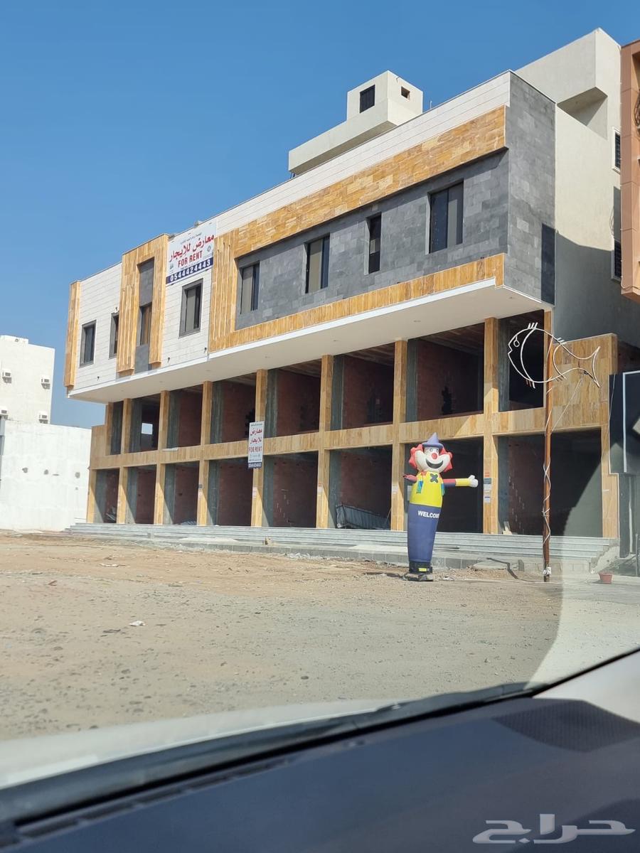 An investment opportunity: 8 shops and 7 apartments in Jeddah Al Fadila, on an international street, 120 meters63380117644803112