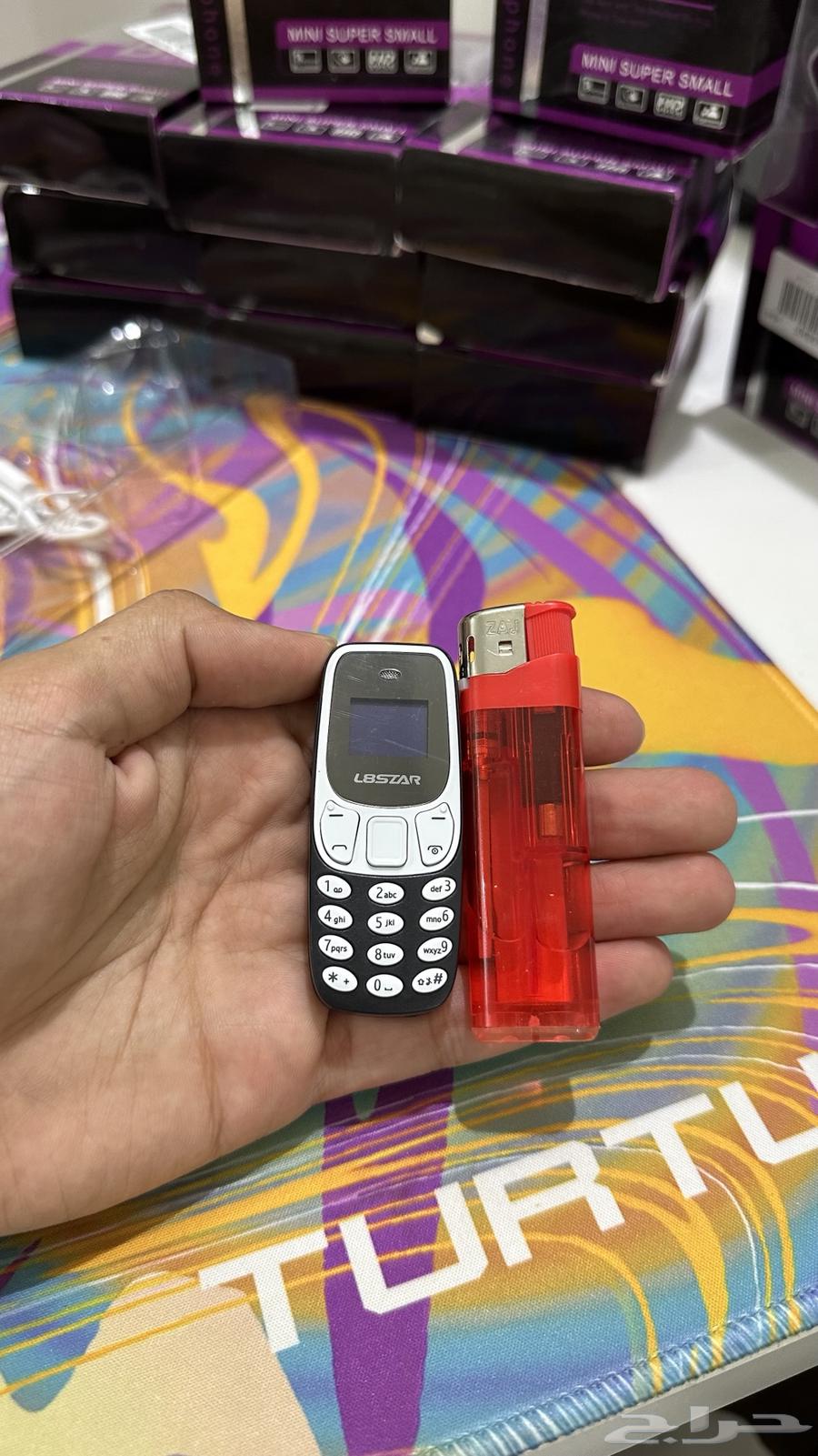 The smallest mobile phone in the world, smaller than a lighter, with voice changing capability63005402777475114