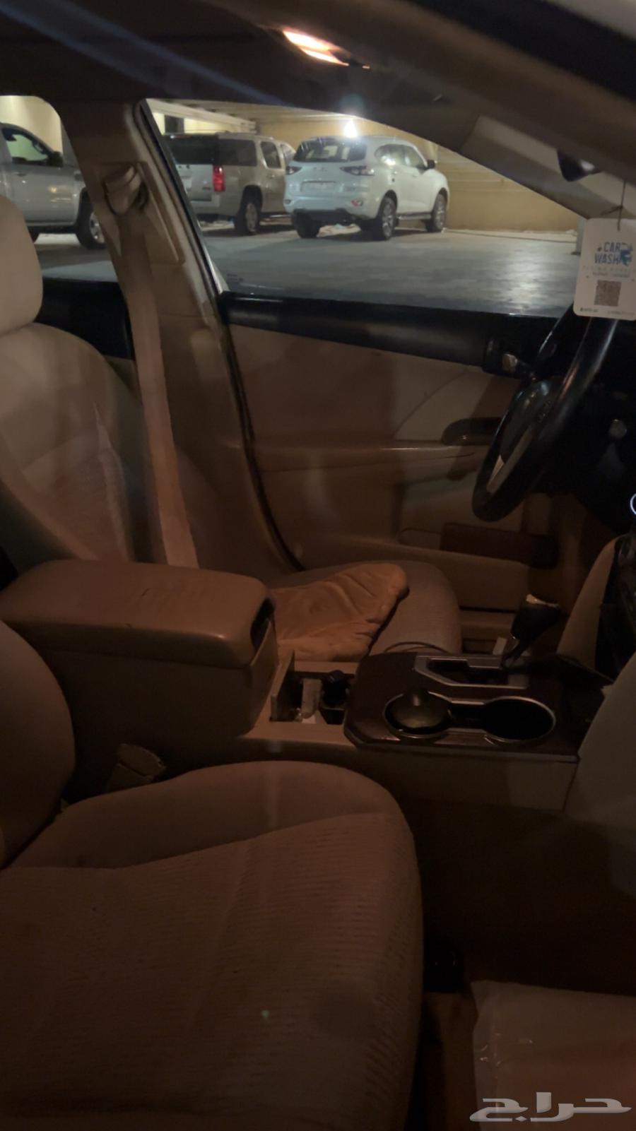 2015 Camry for sale. I need a dealership with a compartment above the gas tank.63005098469505113