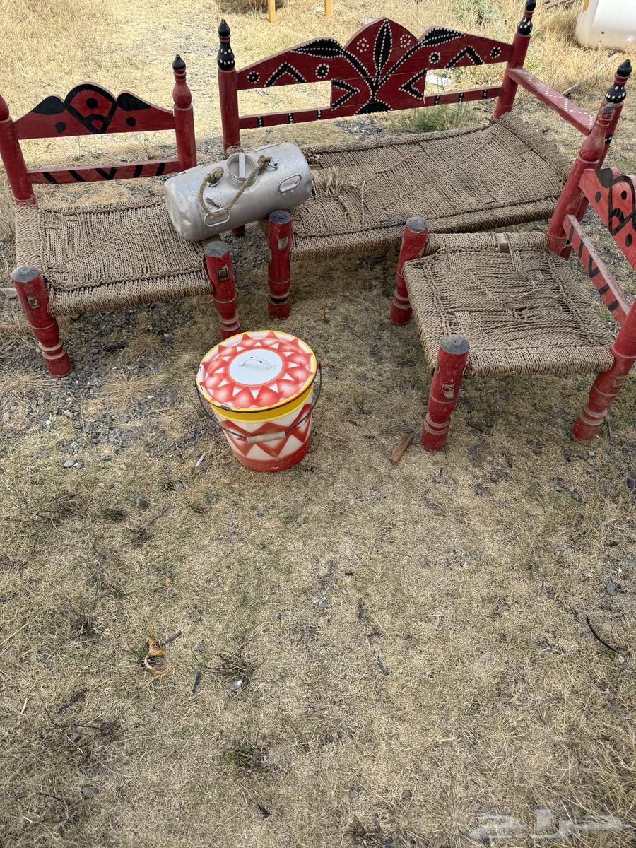 Heritage chairs for sale, milk churns, and a site called "Tanouma".63327927163905111