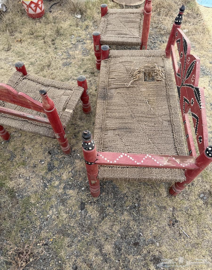 Heritage chairs for sale, milk churns, and a site called "Tanouma".63327927163905113