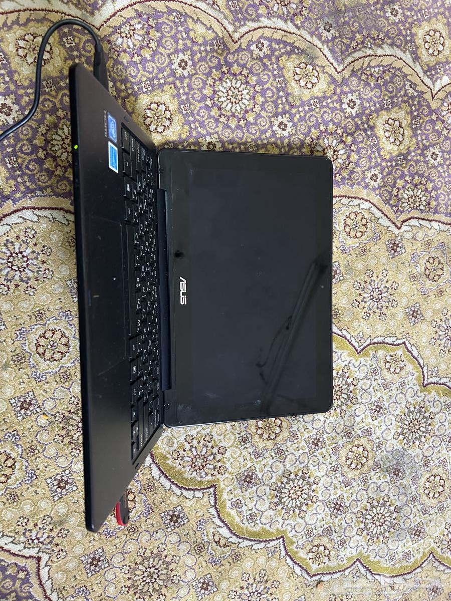 لابتوب اسوس حجم صغير بحالة ممتازة جدا  يعمل بلمس وقابل لطي63389796658178113
