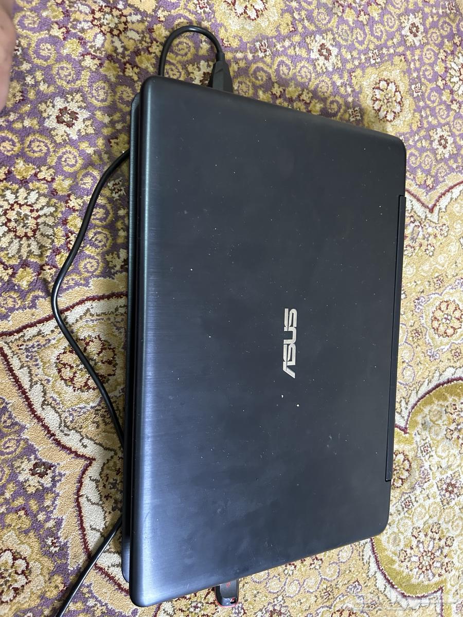 لابتوب اسوس حجم صغير بحالة ممتازة جدا  يعمل بلمس وقابل لطي63389796658178111