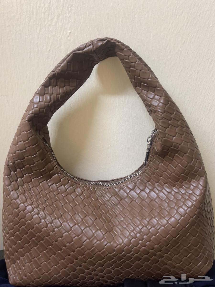 brown leather bag63386175369602112