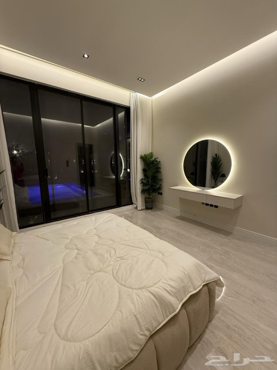 Modern chalet with a living room overlooking the pool and two bedrooms in Al-Khair district63381086431747114