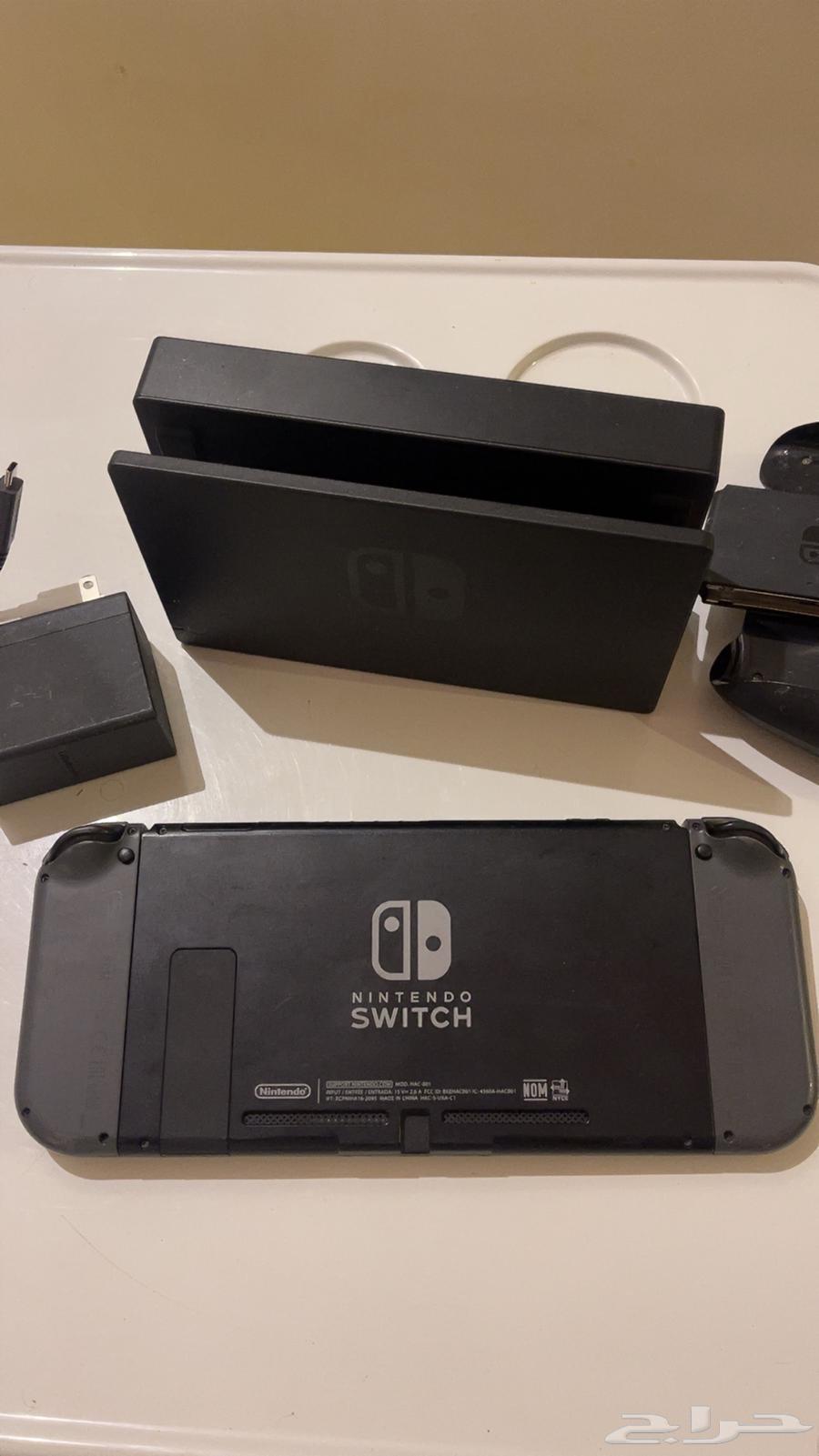 Nintendo Switch device with all accessories and game63618479410563112