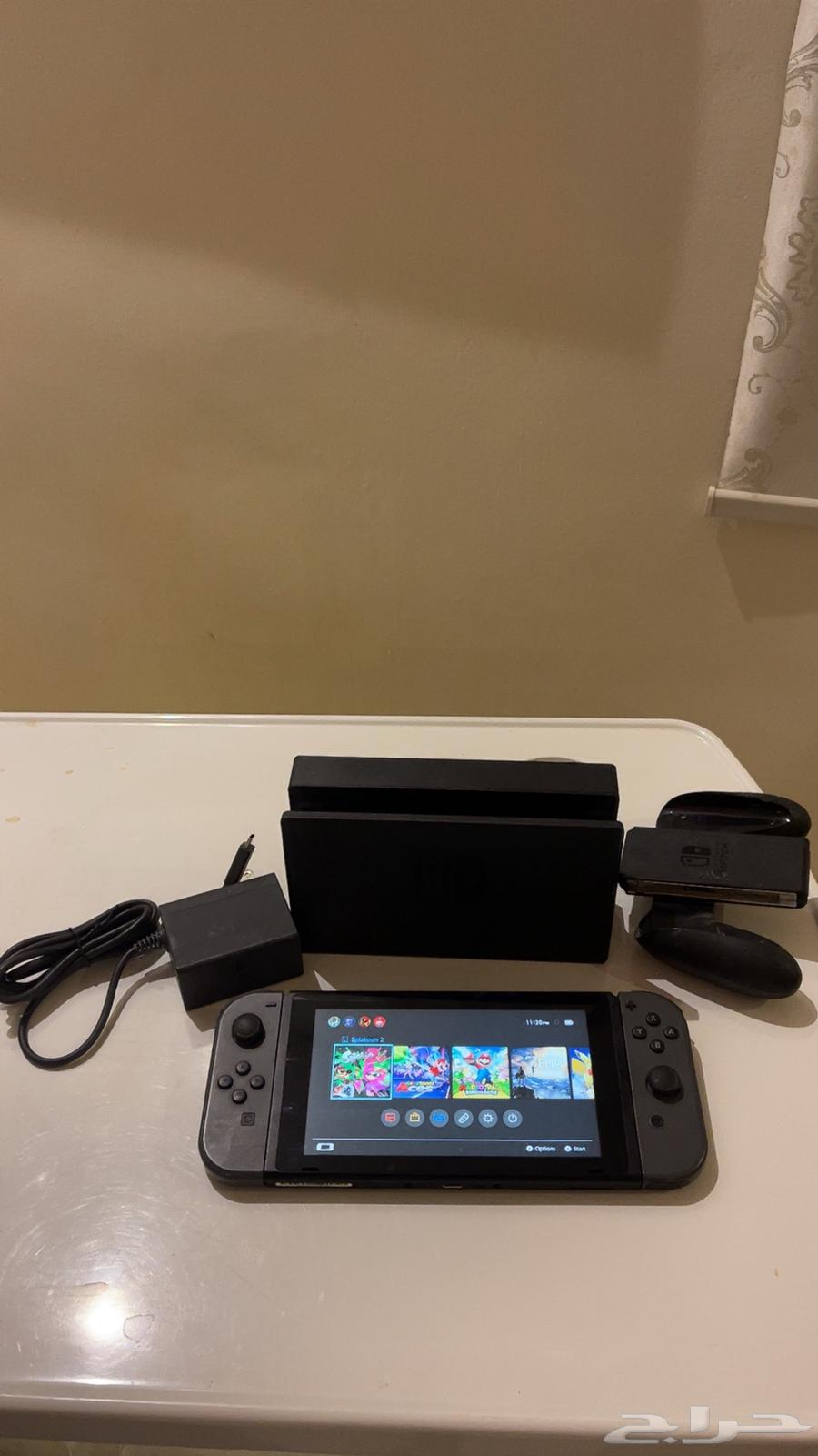 Nintendo Switch device with all accessories and game63618479410563111