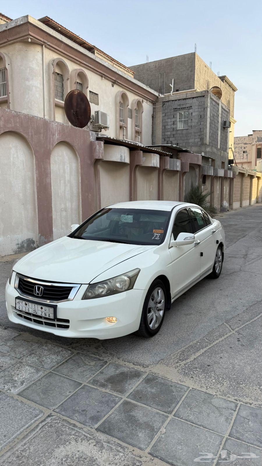 Accord 2009 model, standard, for sale with added accessories such as a spoiler and screen.63618833230211113