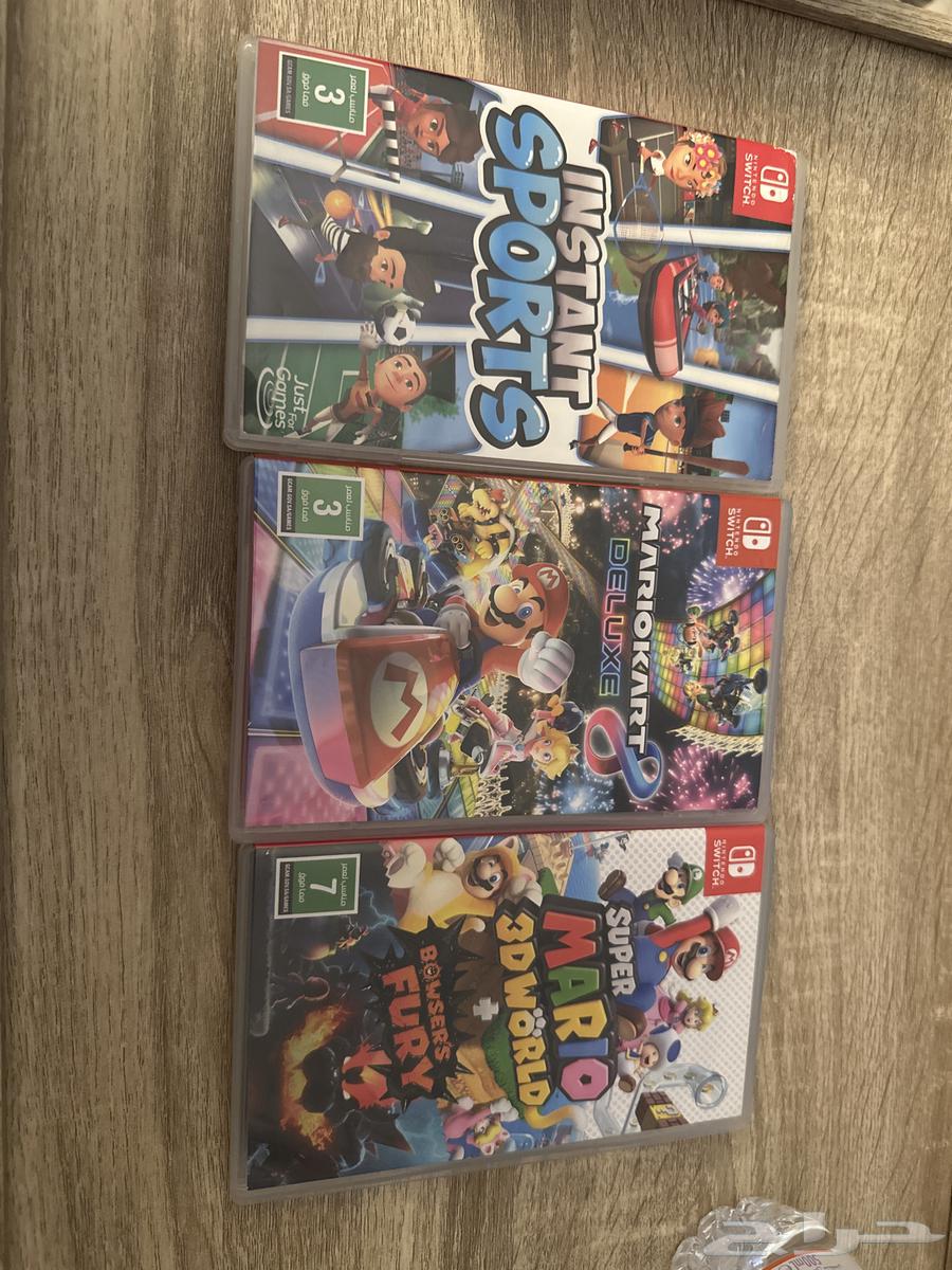 Nintendo Switch OLED Version with Accessories and Games63655319959043110