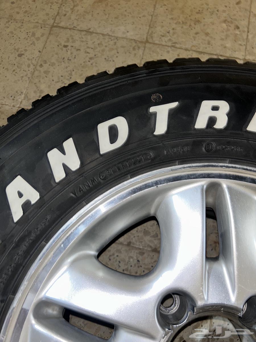 4 original Lexus rims with caps and 3 Dunlop tires63699591014659112