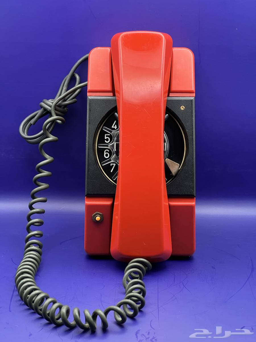 Rare and very old red rotary phone, heritage63667545623681110
