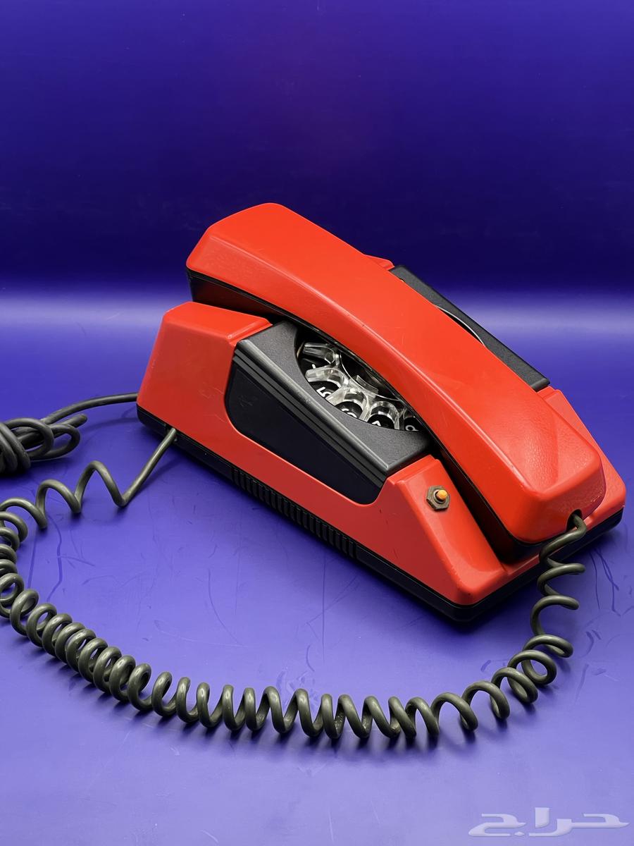 Rare and very old red rotary phone, heritage63667545623681112