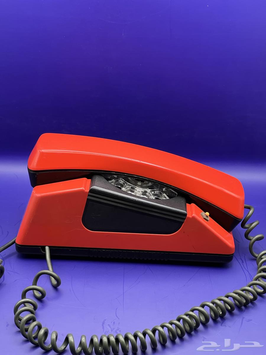 Rare and very old red rotary phone, heritage63667545623681113