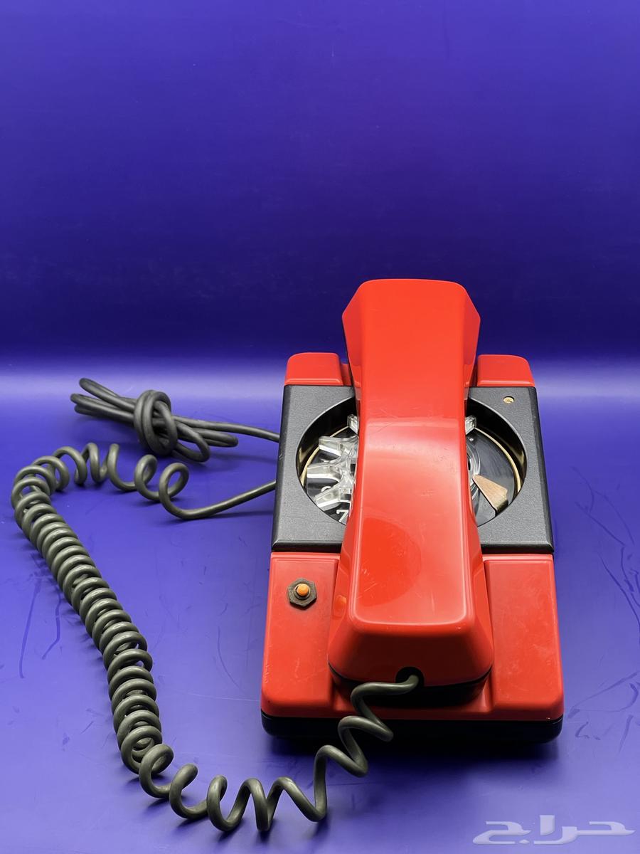 Rare and very old red rotary phone, heritage63667545623681111