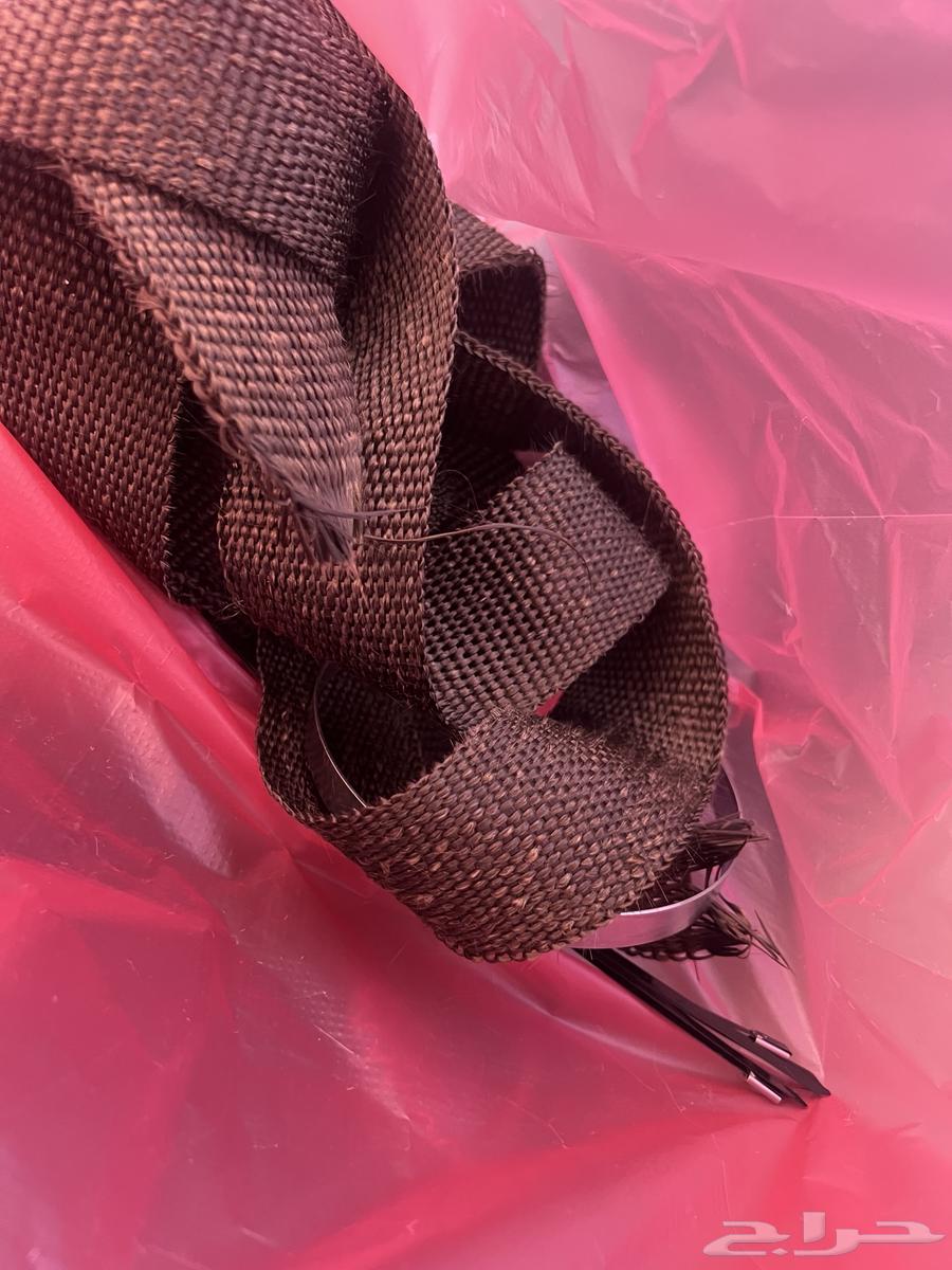 Headliner and fender insulation with a box and straps63710285700353110