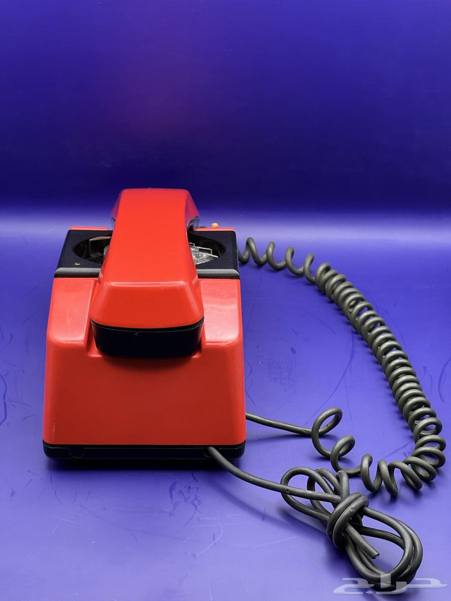 Rare and very old red rotary phone, heritage63667545623681114