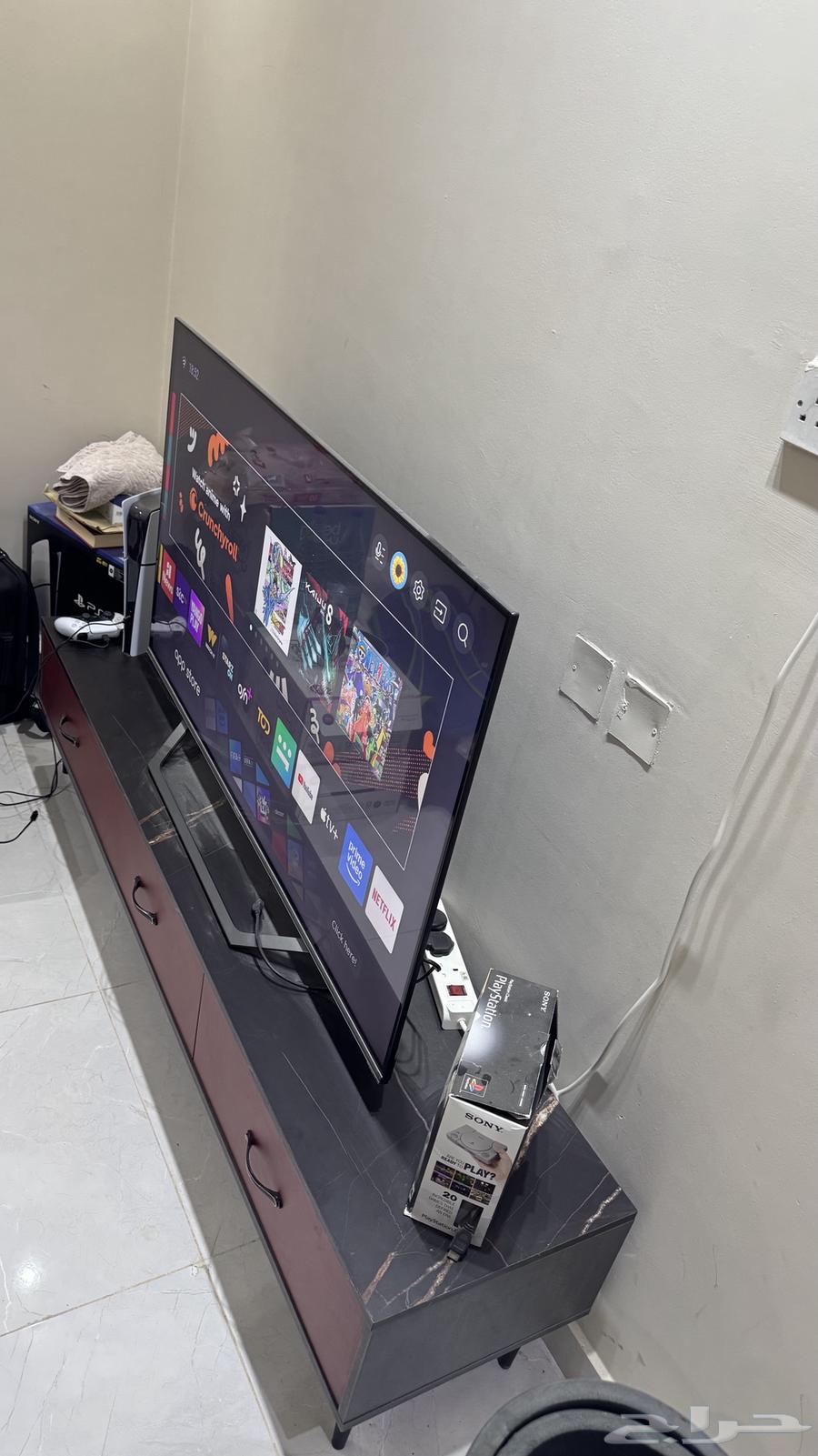 Smart TV (lightly used for less than two years) with TV stand.63672952659074111