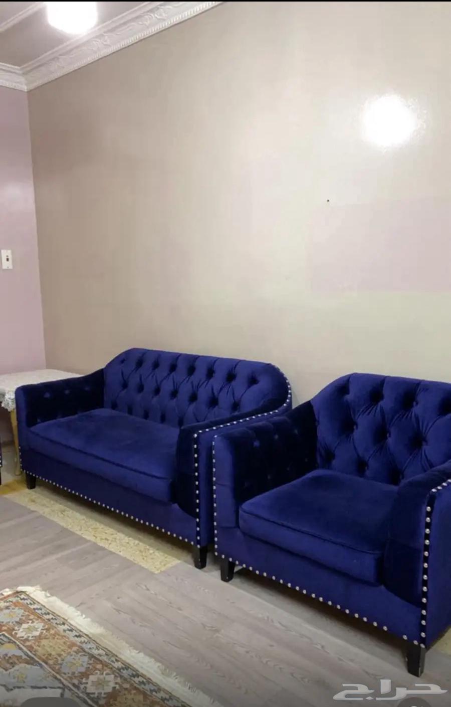 Sofa for sale, water cooler, and baby stroller63674275950337112