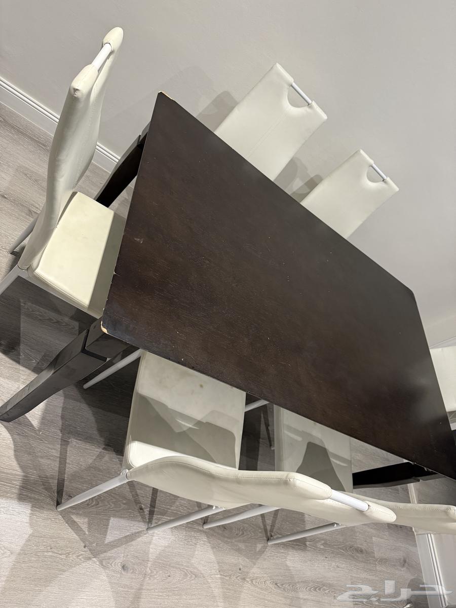Dining table with 6 leather chairs from Home Center - 30063668529956482110