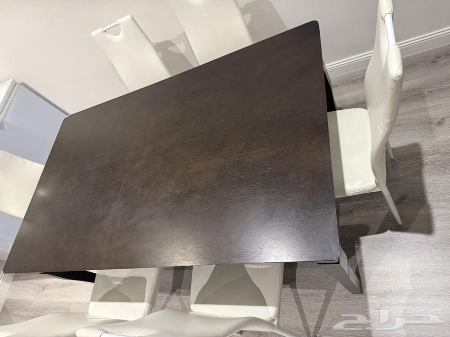 Dining table with 6 leather chairs from Home Center - 30063668529956482112