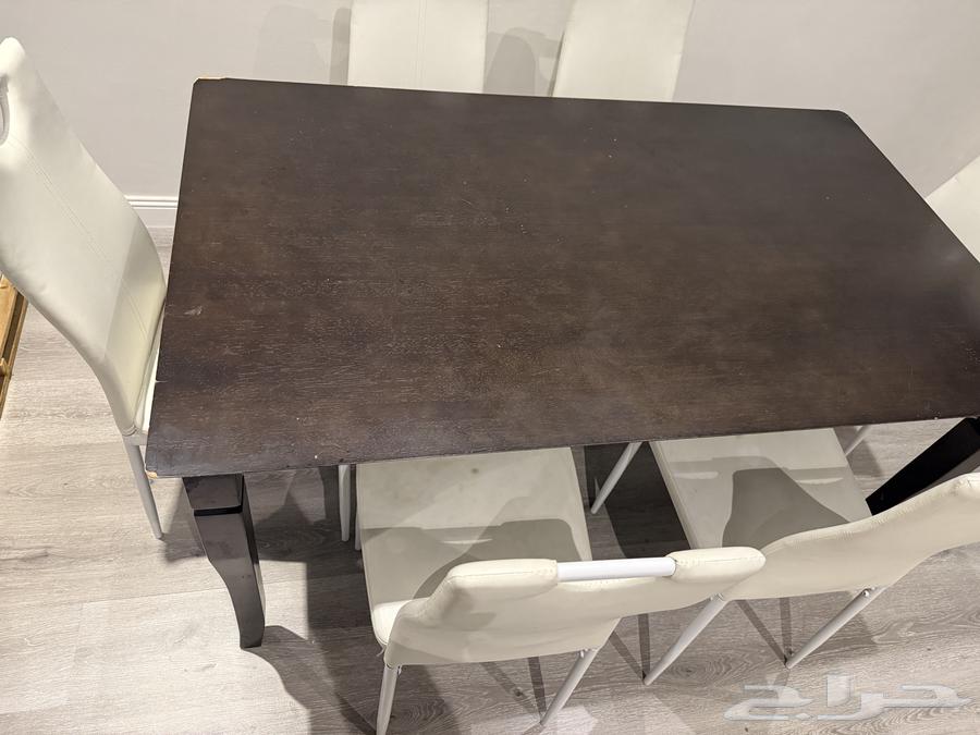Dining table with 6 leather chairs from Home Center - 30063668529956482113