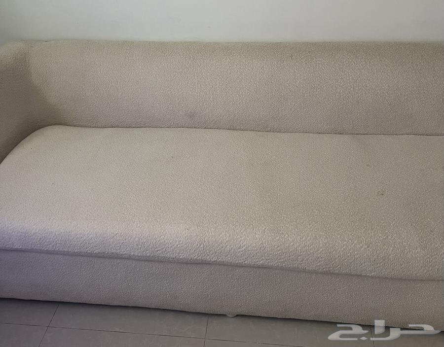 L-shaped beige sofa63680370534659113