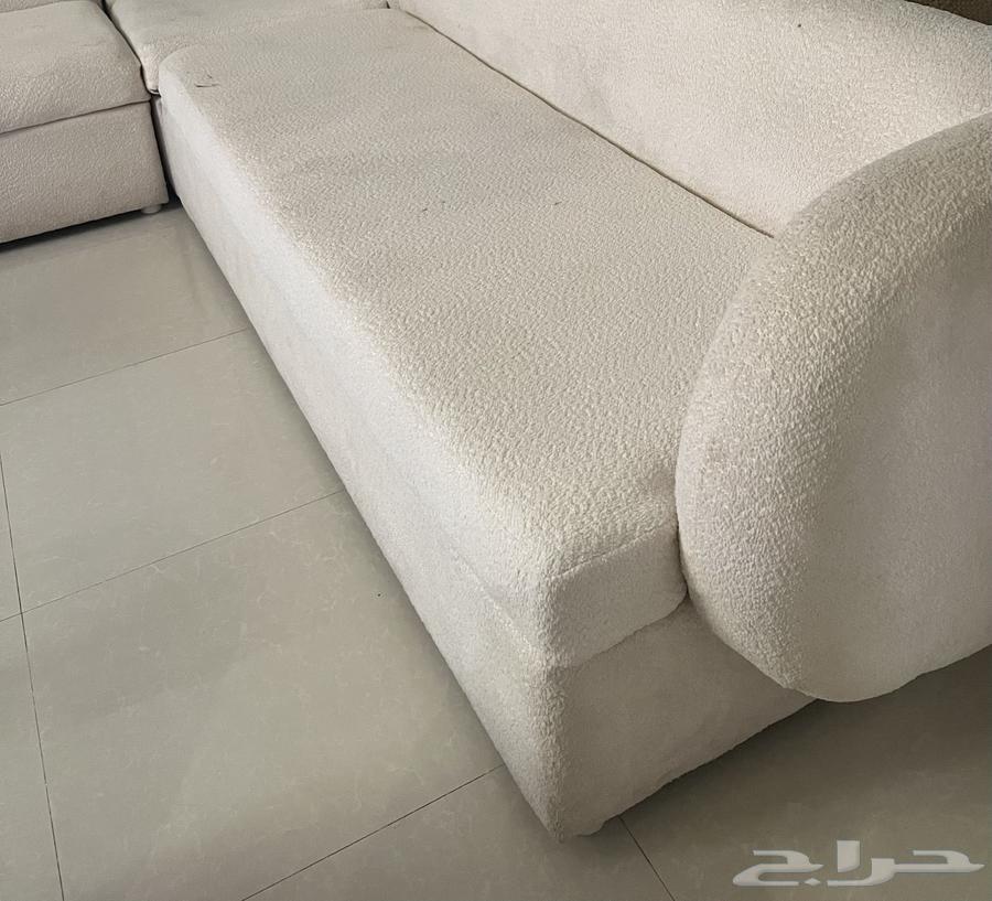 L-shaped beige sofa63680370534659110