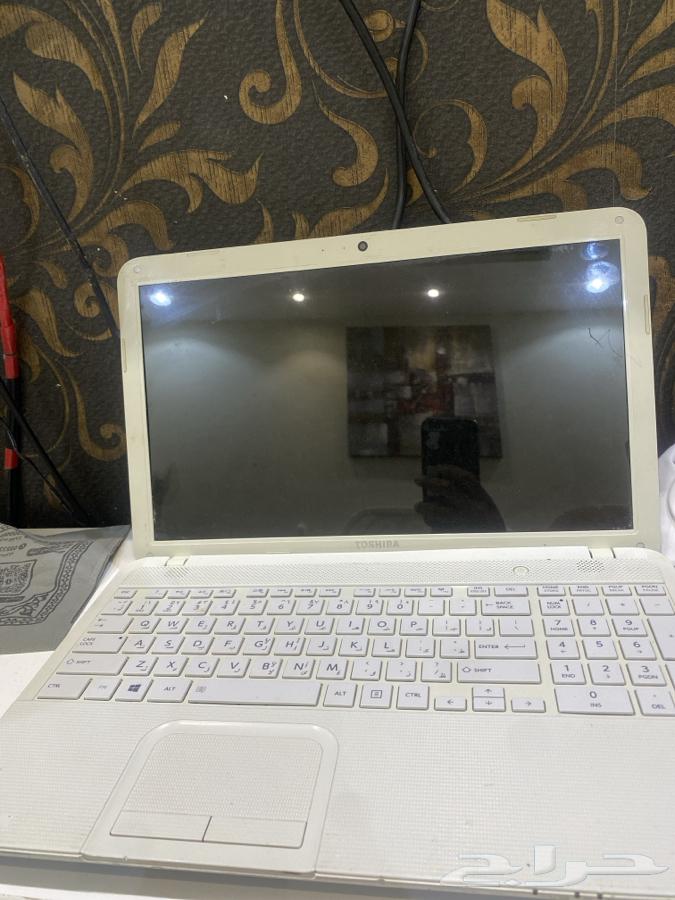 Laptop. Old Toshiba, 10 years old, doesn't work. Only turns on fan and shuts down63699004710147110