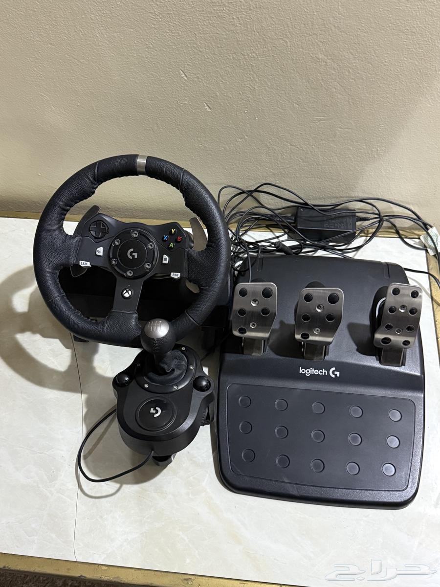 Xbox with steering wheel, sports car seat, and Forza game63699621965571112