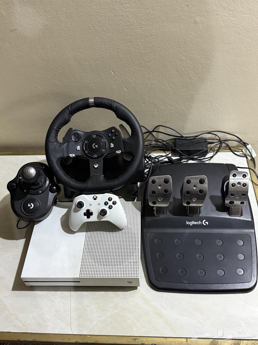 Xbox with steering wheel, sports car seat, and Forza game63699621965571113