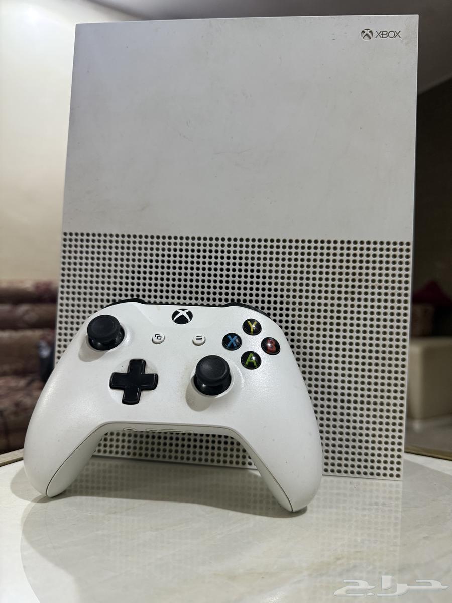 Xbox with steering wheel, sports car seat, and Forza game63699621965571110