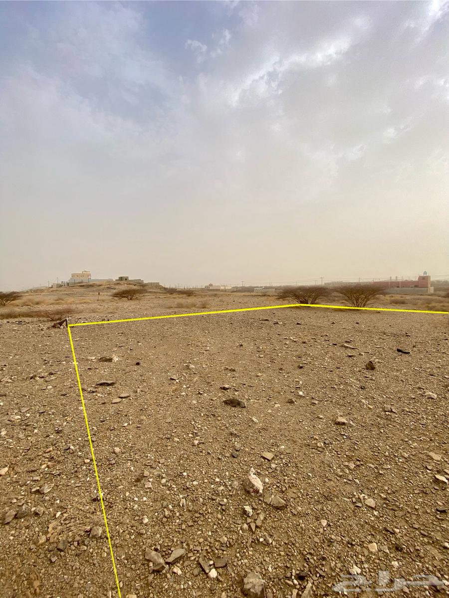 Residential and commercial land in Rajal Al-Ma' with 30-meter street and parking spaces on title deed63611898715523113