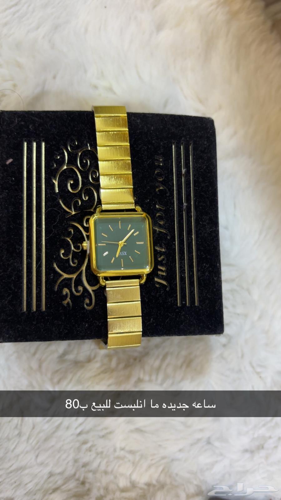 Two watches, a rosary, and a ring63699633037954111