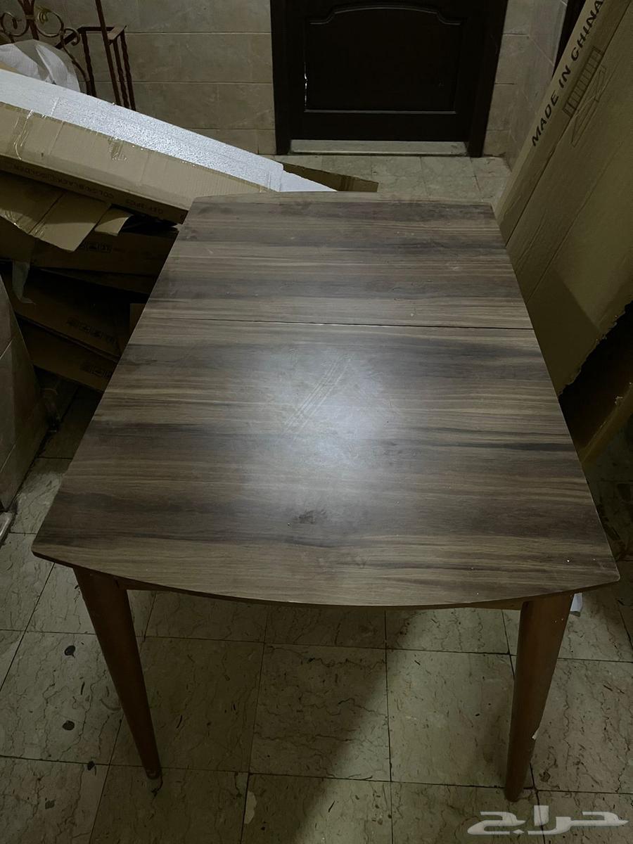 Sofa, table, and curtains63705944316931111