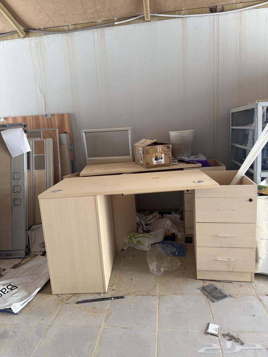 Office desks, cabinets, and also a meeting table63699632864642112