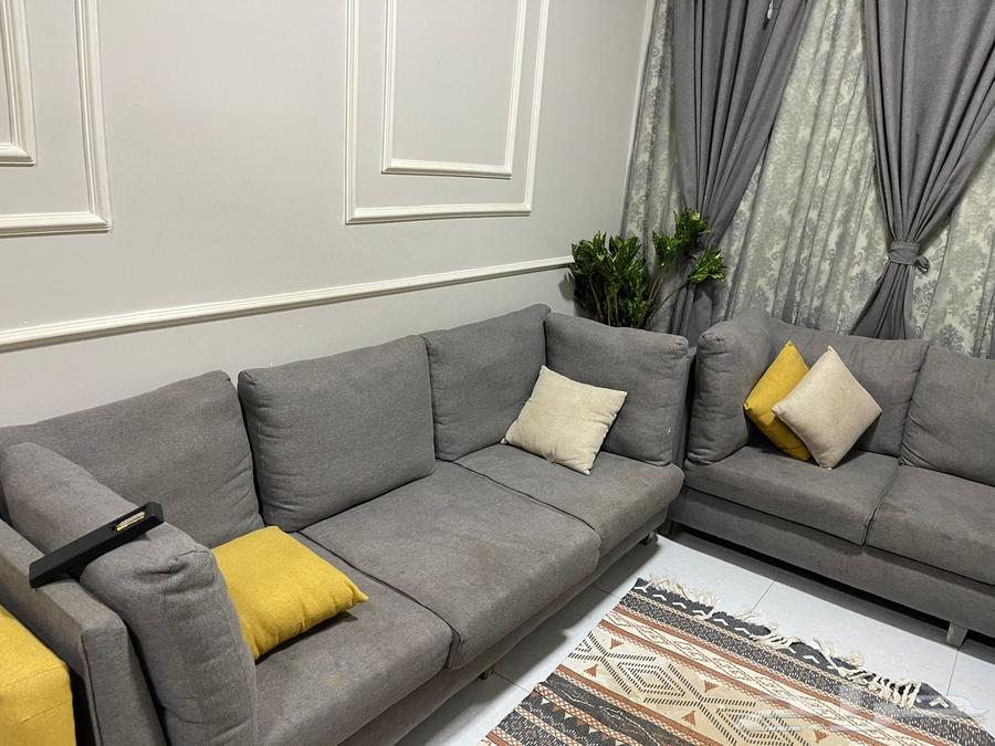 Sofa, table, and curtains63705944316931113