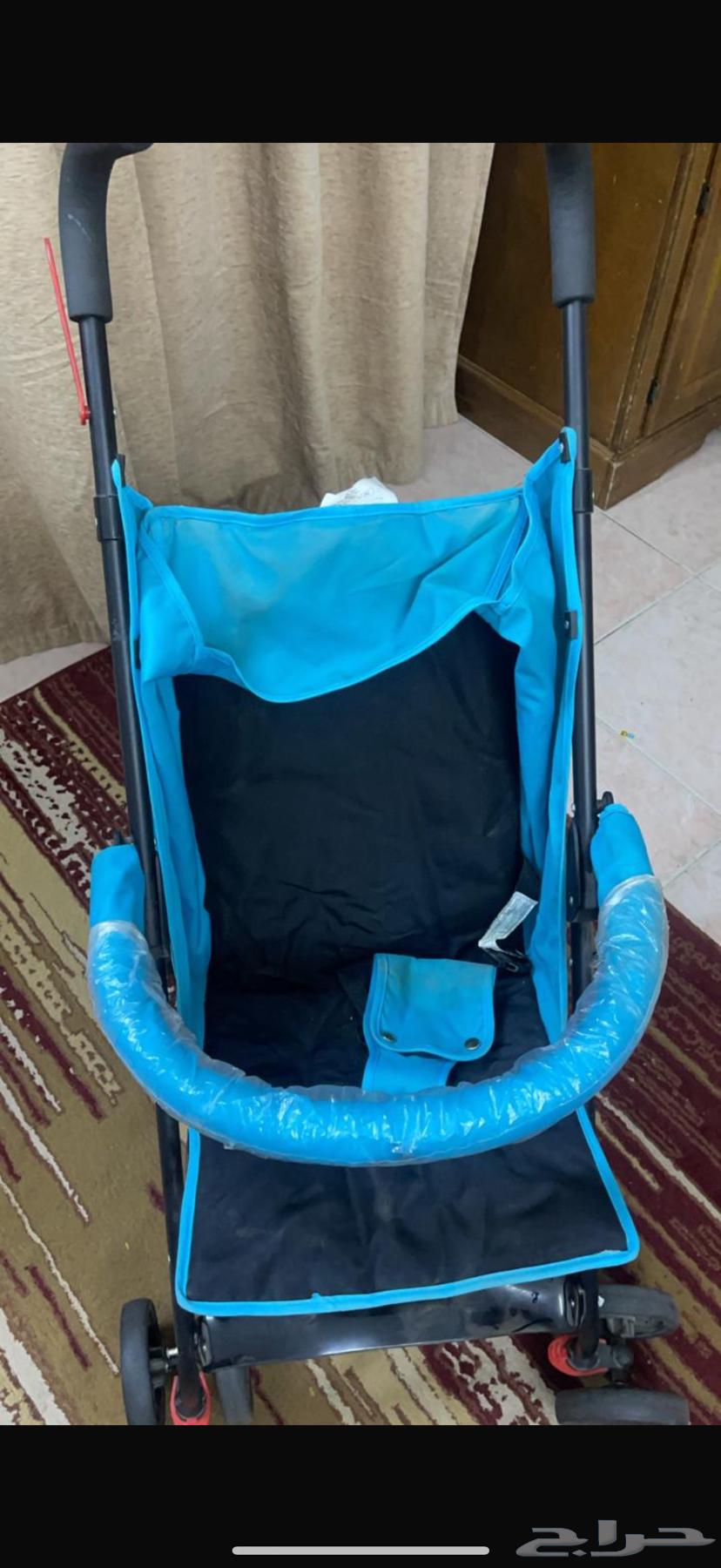 كرسي اطفال وعربايه63703677588098111