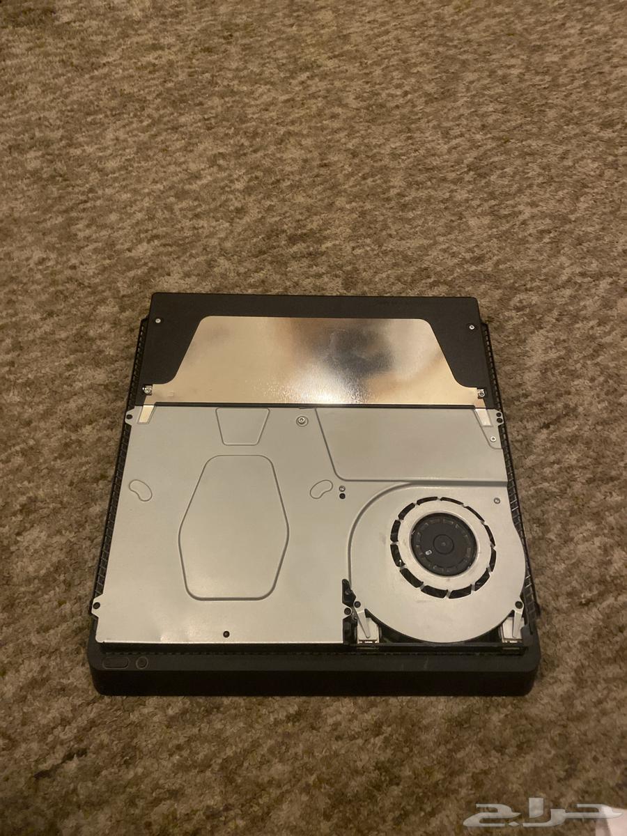 Sony 4 with case having cracks and removed sides and screws63706297853954110
