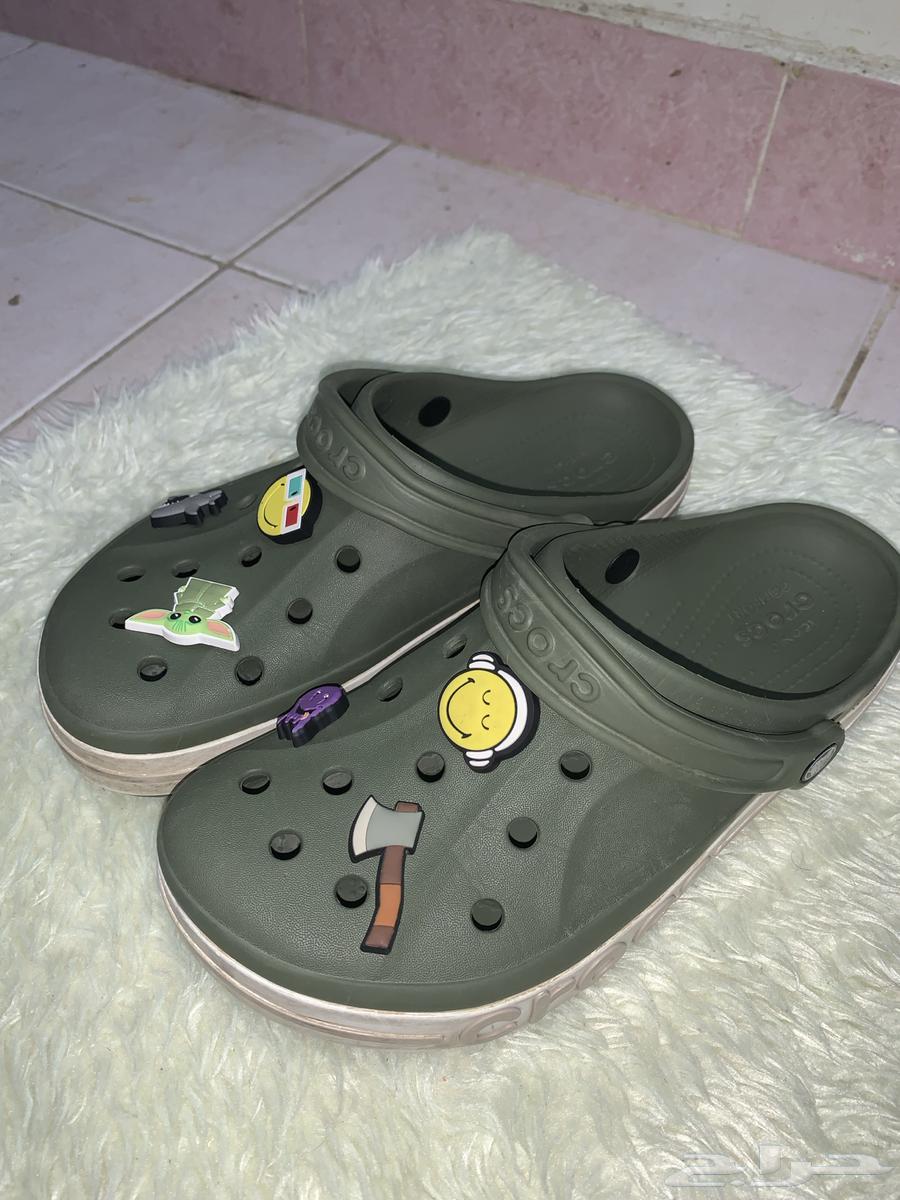CROCS green shoe with stickers, used but clean63707400586882113