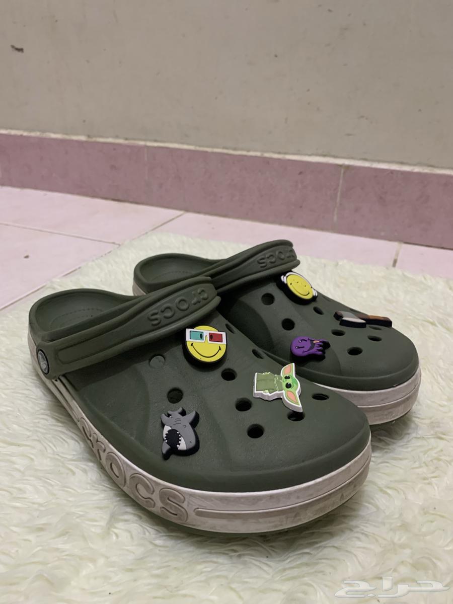 CROCS green shoe with stickers, used but clean63707400586882112