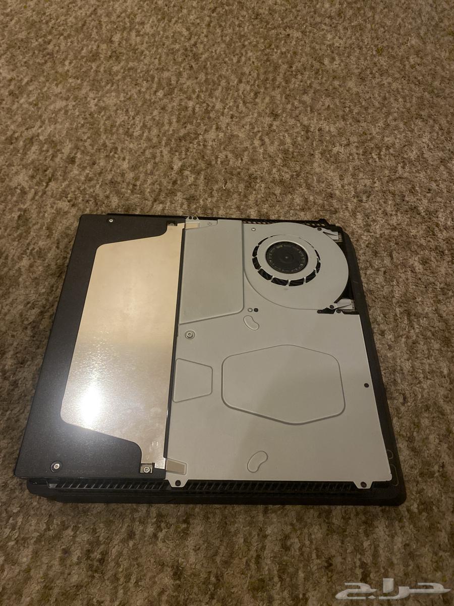 Sony 4 with case having cracks and removed sides and screws63706297853954111