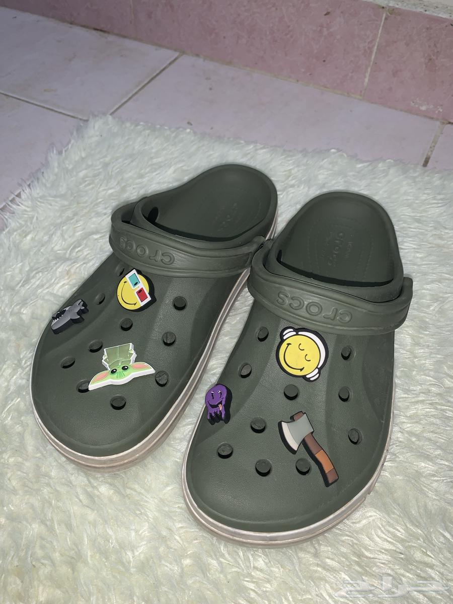 CROCS green shoe with stickers, used but clean63707400586882110