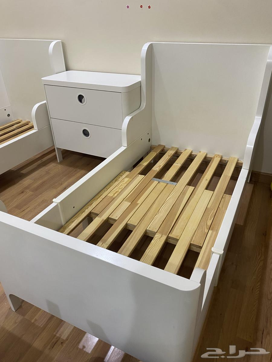 Two beds and the table between them from IKEA63738854679041110