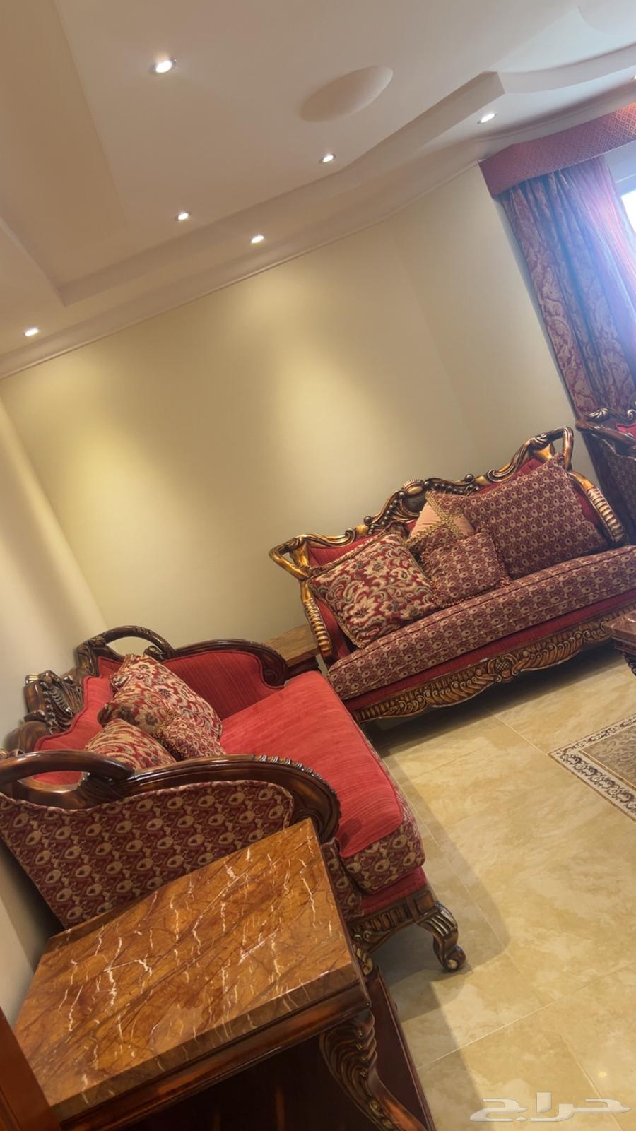 Sofas, tables, and curtains63743675842050112