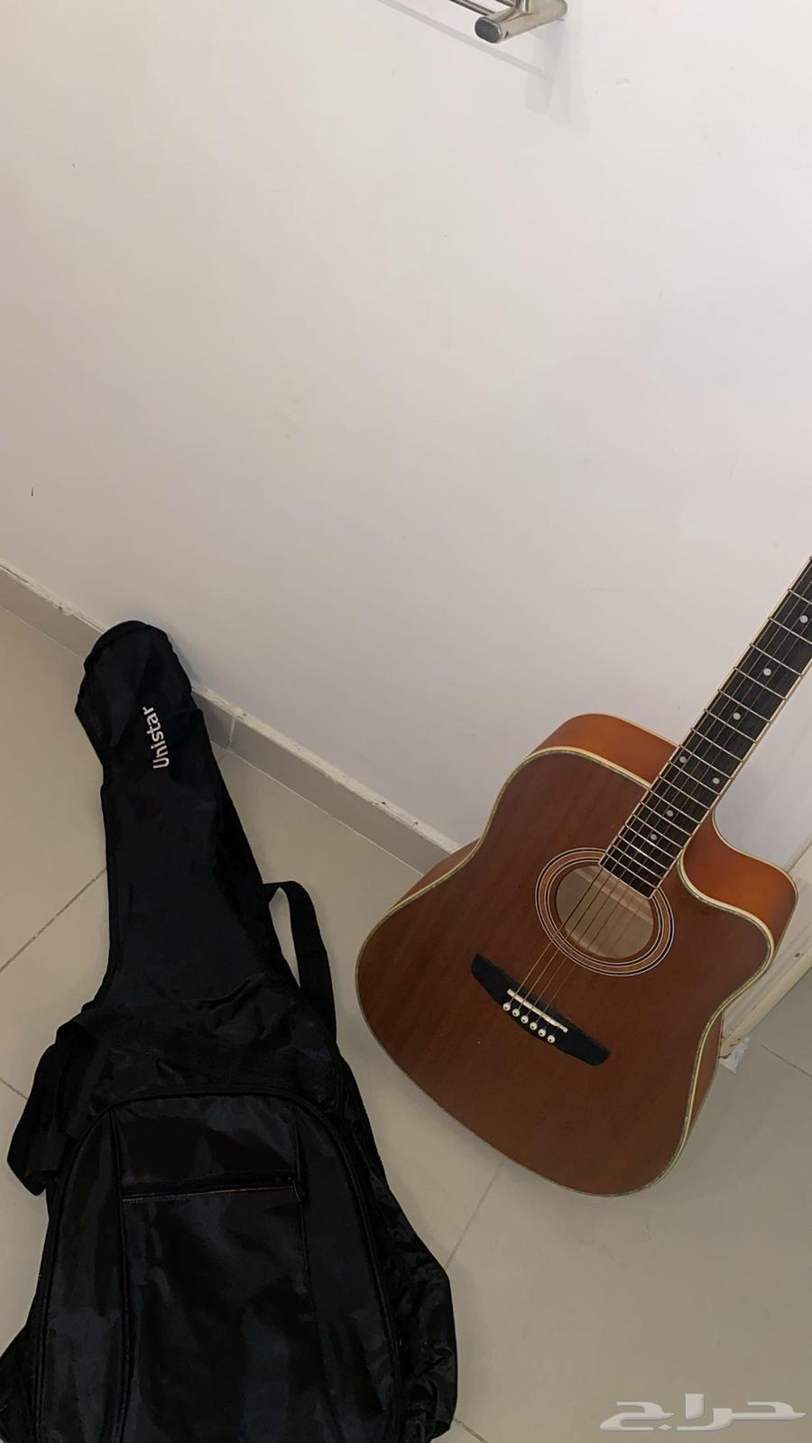 Acoustic guitar63847158944002112