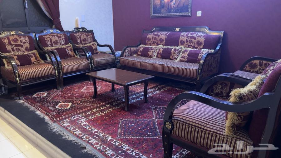 A sofa set suitable for 9 people with a wooden table in the text63747241509377111