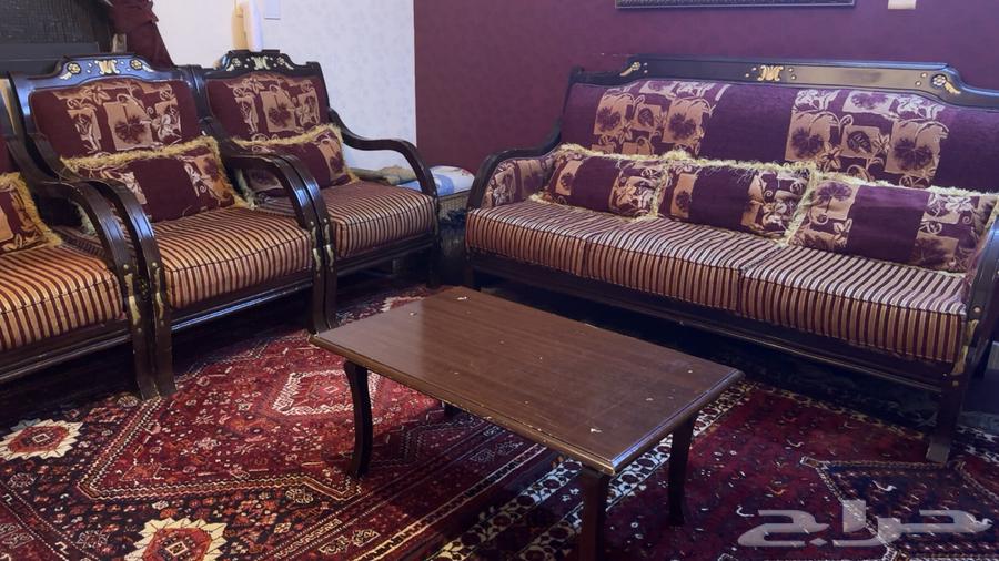 A sofa set suitable for 9 people with a wooden table in the text63747241509377110