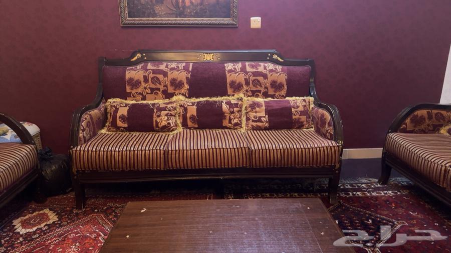 A sofa set suitable for 9 people with a wooden table in the text63747241509377113