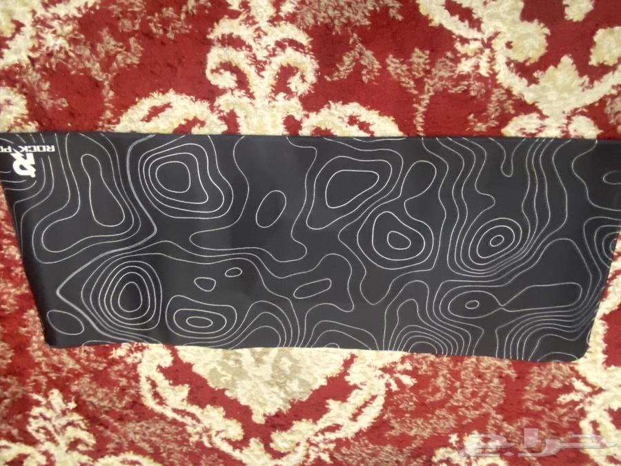 PlayStation, mouse, PlayStation cables, tapes, mouse pad, and piece63748363191170113