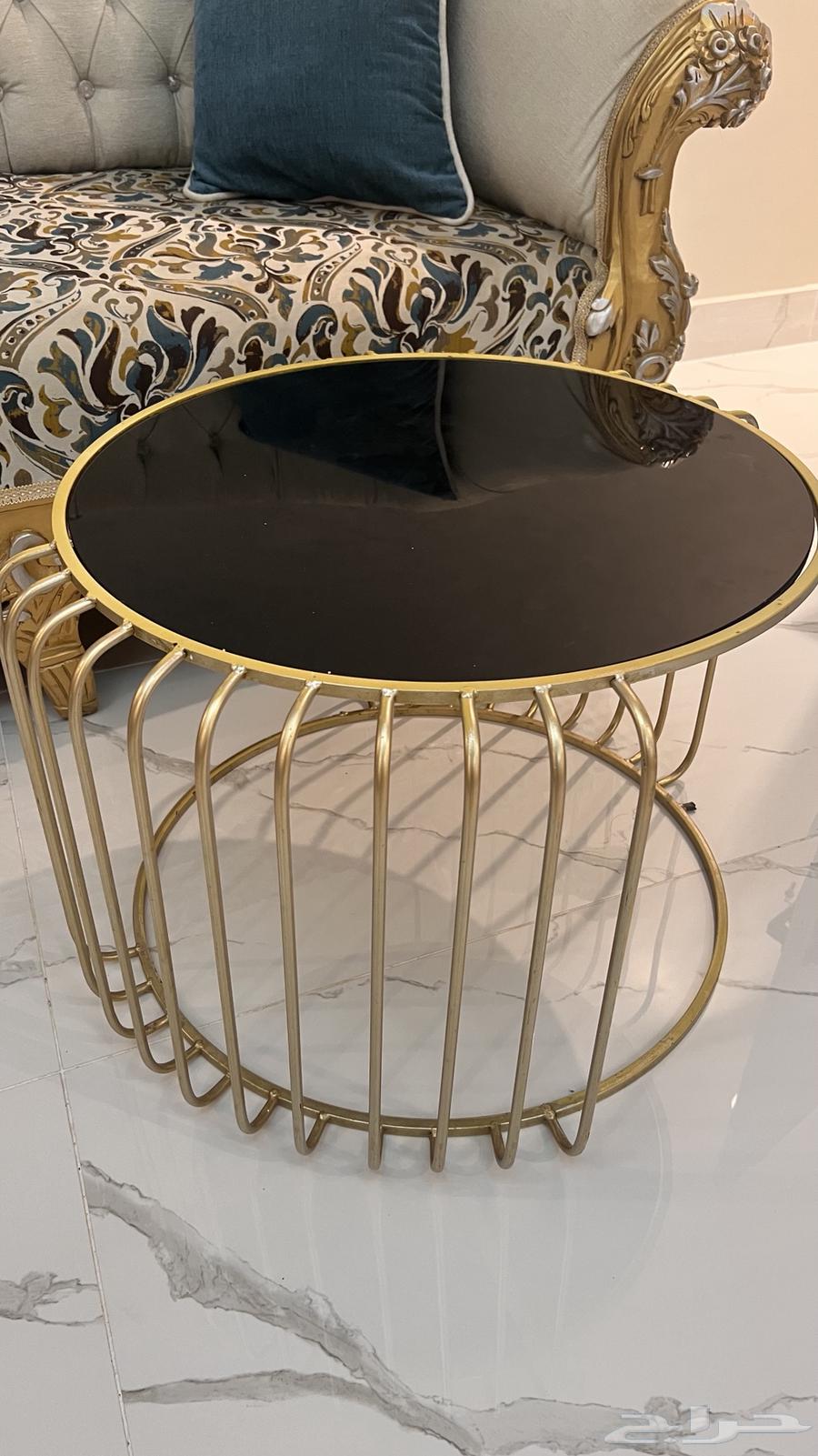 Golden table with black glass, I want it for (50 SAR)63758723719683110